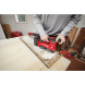 Стрічкова шліфмашина акумуляторна Milwaukee M18 FBTS75-552X 4933479615